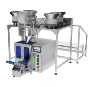 Maszyna, automat pakujący z 4 podajnikami + dorzut ręczny.